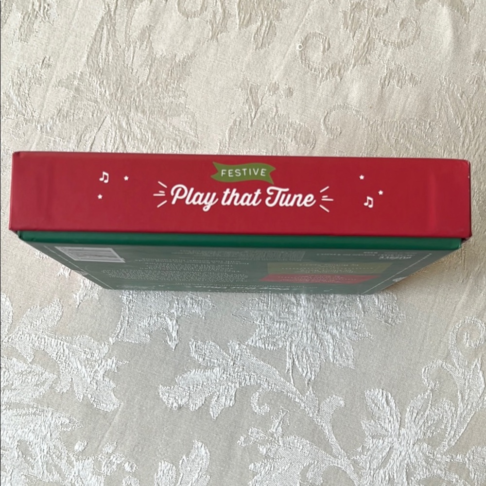 Demdaco Festive Play That Tune Activity Kazoo Game - Red and White - Picture 5 of 5